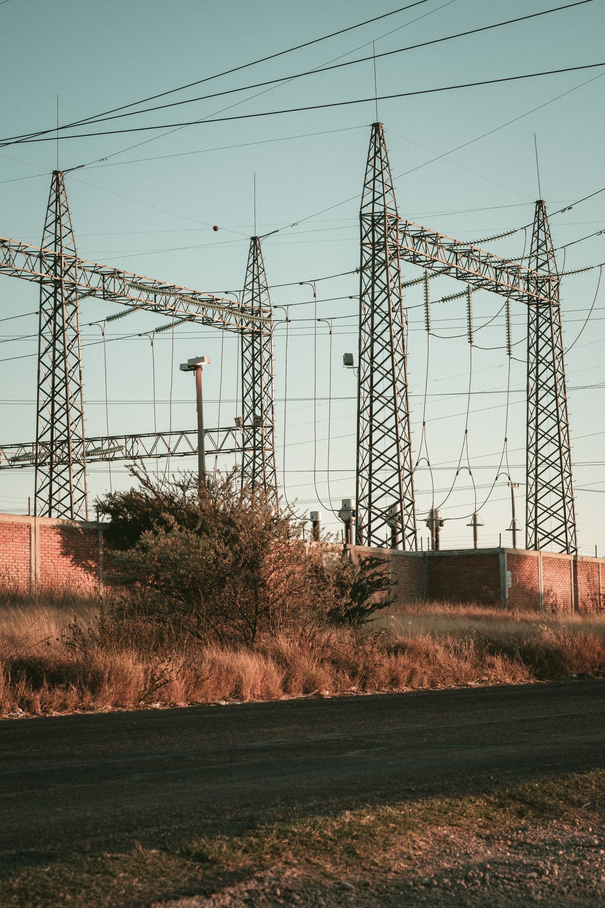 High voltage substation gantries and incoming power lines